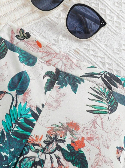 Island Vibes Sleeveless Crop Top & Tropical Leaf Print Pant Set – Bold, Breezy & Stylish"